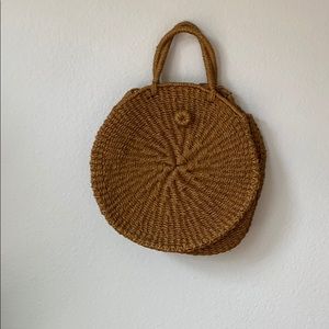 Mustard colored circle straw bag